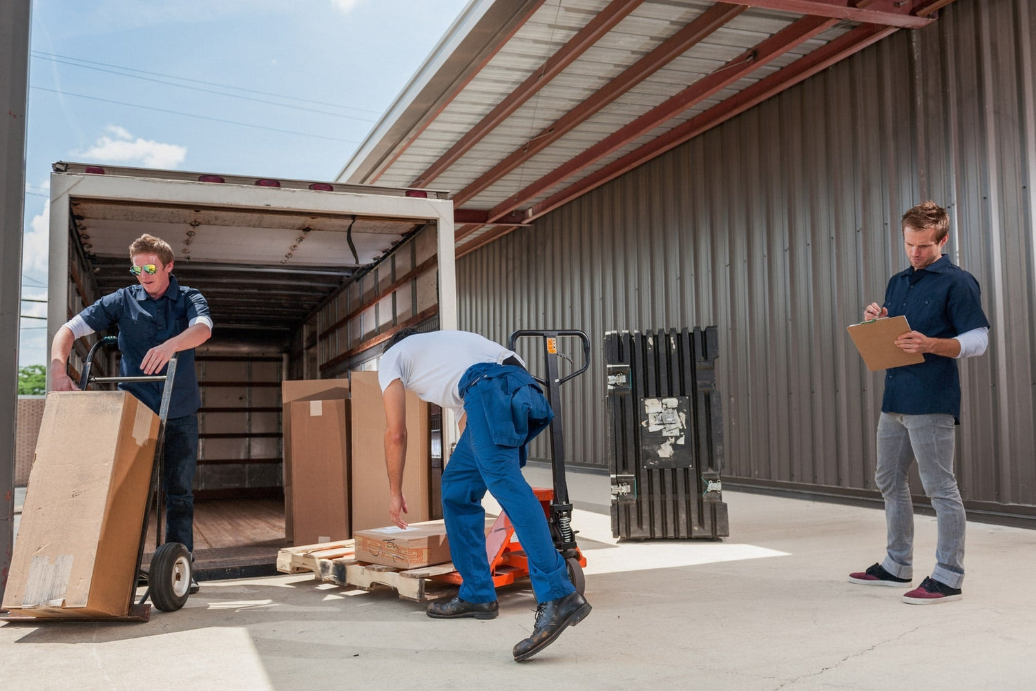 Truck full of large items being delivered